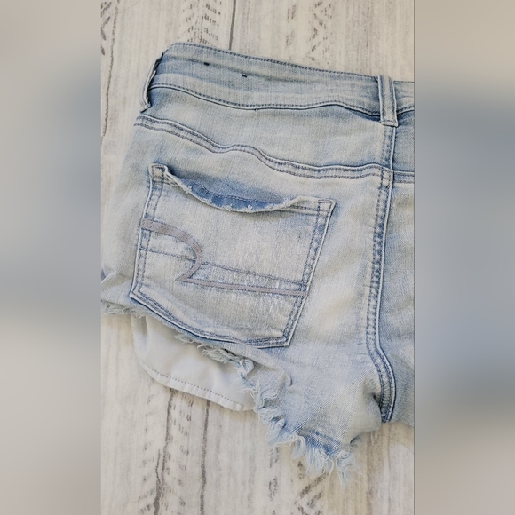 American Eagle Outfitters distressed blue denim shorts Size 10 - Picture 12 of 16